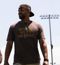 Béisbol No Es Aburrido - Brown Shirt Gold Lettering